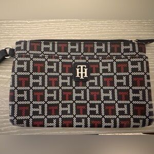 Tommy Hilfiger Patterned wristlet in Black and Red